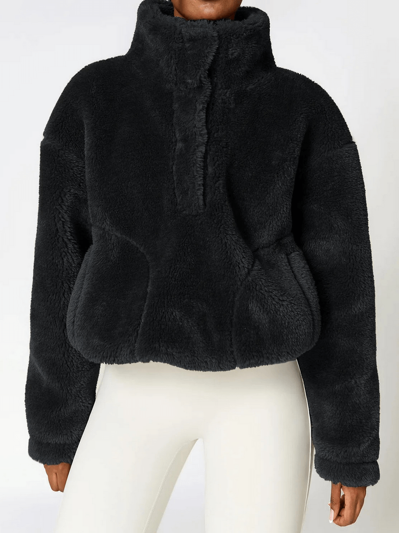 Long sleeved outdoor loose fitting lamb fleece jacket for women, in black, featuring a cozy design for yoga and outdoor activities.